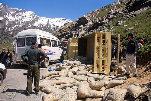 overturned truck - rohtang pass - manali to leh road (india), crash, lorry accident, overturned truck, road, rohtang pass, rohtangla, rollover, sand bags, tata motors, traffic accident, truck accident, wreck