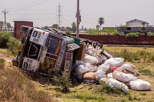 overturned truck with spilled cargo (india), 2515 cex, cargo, crash, freight, load, lorry accident, overturned, road, rollover, sacks, spilled, tata motors, traffic accident, truck accident, wreck