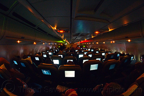 passenger cabin at night - airbus a340, airbus a340, flight lx-39, glowing, inside, interior, night, passenger cabin, passenger plane, swiss air, swiss international air lines, vanishing point, video screens