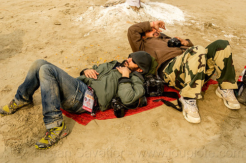 photographers napping - jordano cipriani - kumbh mela 2013 (india), cameras, hindu pilgrimage, hinduism, jordano cipriani, kumbh mela, laying down, men, napping, press pass, press photographers, resting, sleeping