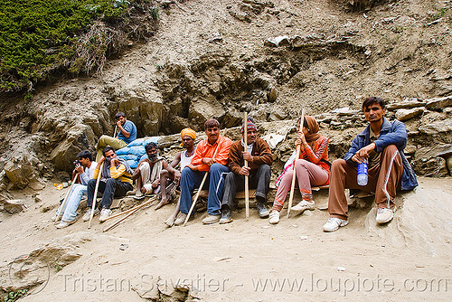 pilgrims with walking sticks resting on trail - amarnath yatra (pilgrimage) - kashmir, amarnath yatra, hiking canes, hindu pilgrimage, kashmir, mountain trail, mountains, pilgrims, resting, walking sticks