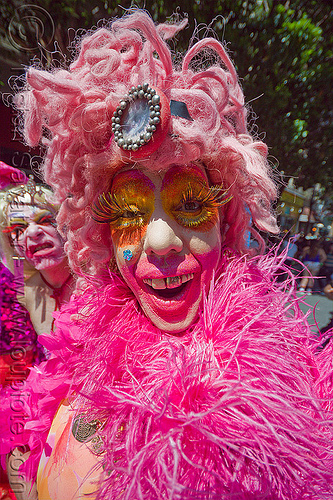 pink drag queen, drag queen, face painting, facepaint, fake eyelashes, gay pride festival, makeup, pink feathers, pink wig