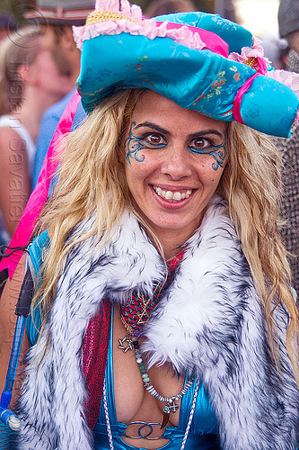 raver fashion - amit, amit, blonde, blue hat, eye makeup, fashion, furry vest, necklaces, pink ribbon, raver, woman