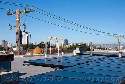 rooftop solar panels and power lines, electrical lines, electrical transformer, electricity, photovoltaic array, power lines, rooftop, solar array, solar energy, solar panels