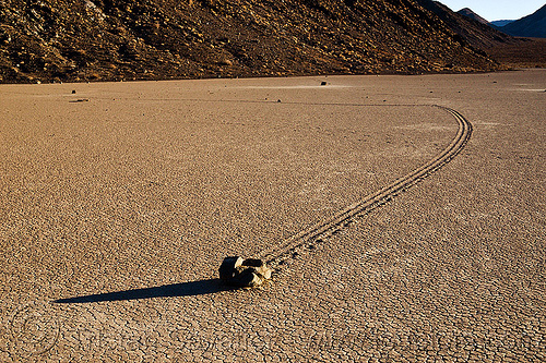 sailing stone curvy path on the racetrack - death valley, cracked mud, curve, death valley, dry lake, dry mud, landscape, mountains, racetrack playa, rock, sailing stones, sliding rocks