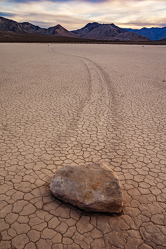 sailing stone on the racetrack - death valley, cracked mud, death valley, dry lake, dry mud, landscape, mountains, racetrack playa, sailing stones, sliding rocks