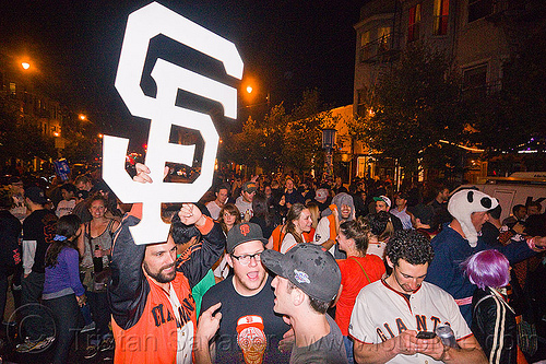 sf giants fans celebrating, 2012 world series, baseball fans, celebrating, crowd, editorial, go giants, night, partying, sf giants logo, sports fans, street party