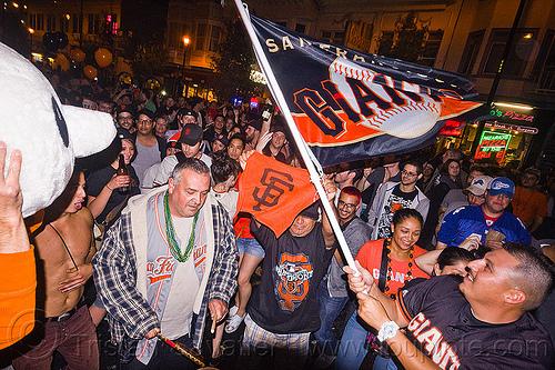 sf giants fans celebrating, 2012 world series, baseball fans, celebrating, crowd, editorial, flag, go giants, night, partying, sf giants, sports fans, street party