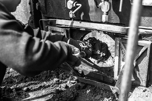 shoveling coal in furnace of steam locomotive - darjeeling (india), boiler, burning, coal, darjeeling himalayan railway, darjeeling toy train, fire, furnace, man, narrow gauge, railroad, shoveling, steam engine, steam locomotive, steam train engine, worker