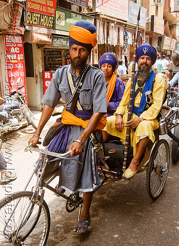 sikh devotees on cycle rickshaw - amritsar (india), amritsar, cycle rickshaw, headdress, headwear, men, nihang warriors, punjab, sikh man, sikhism, spear, trike, turban, wallah