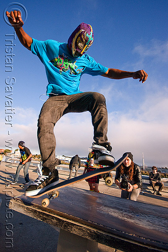skateboarder jumping - superhero street fair (san francisco), islais creek promenade, man, skateboard wheelie, skateboarder, skateboarding trick, superhero street fair, wrestler mask