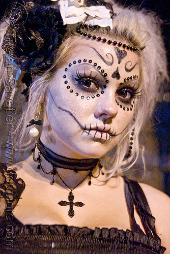skull makeup - black bindis - dia de los muertos - halloween (san francisco), bindis, cross, day of the dead, dia de los muertos, face painting, facepaint, halloween, night, sugar skull makeup, woman