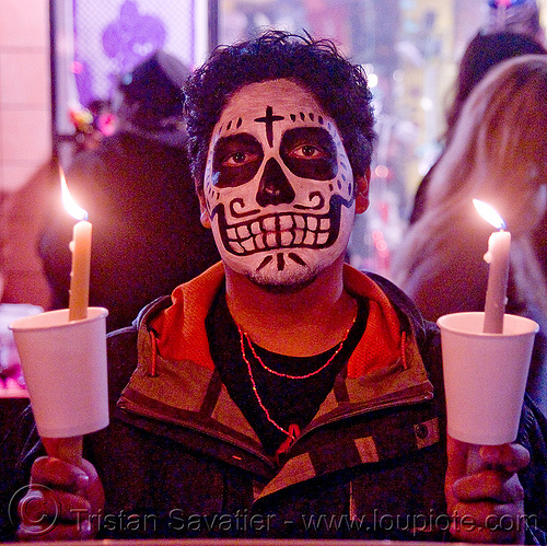skull makeup - candles - dia de los muertos - halloween (san francisco), candlelight vigil, candles, day of the dead, dia de los muertos, face painting, facepaint, halloween, man, night, sugar skull makeup
