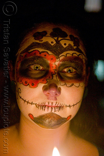 skull makeup - green eyes - dia de los muertos - halloween (san francisco), candle, day of the dead, dia de los muertos, face painting, facepaint, halloween, night, sugar skull makeup, woman