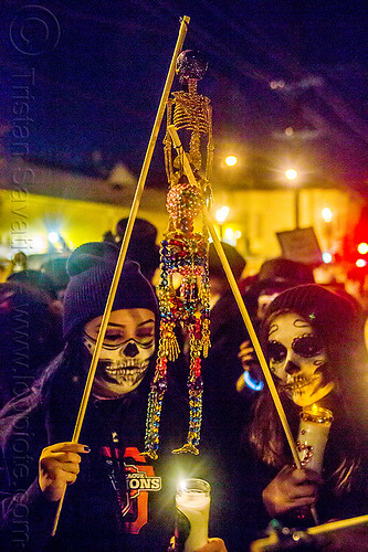small decorative skeletons - dia de los muertos procession (san francisco), beads, candle, day of the dead, dia de los muertos, face painting, facepaint, halloween, hanging, night, skeletons, skull makeup, women