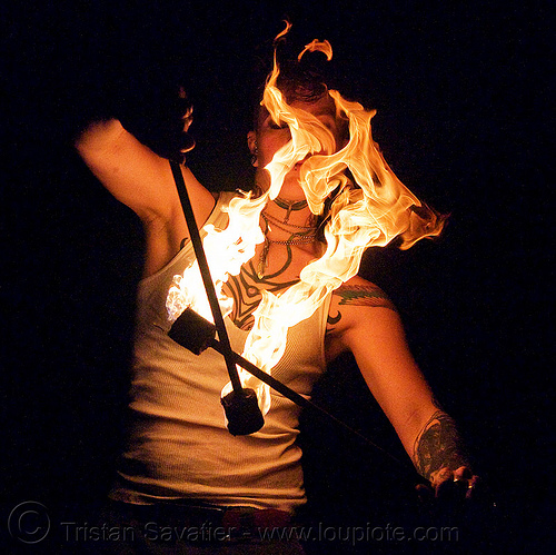 spinning fire poi (san francisco) - fire dancer - leah, fire dancer, fire dancing, fire performer, fire poi, fire spinning, leah, night, spinning fire, tattooed, tattoos, woman