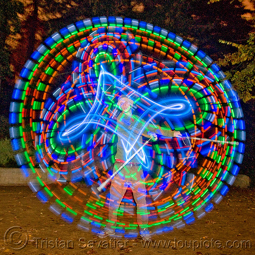 spinning led light poi - glowing - flowlight, circle, fire dancer, fire dancing, fire performer, fire spinning, glowing, led lights, led poi, light poi, man, nicky evers, night, ring, spinning fire