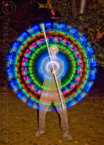 spinning led light staff - glowing - flowlight, circle, fire dancer, fire dancing, fire performer, fire spinning, glowing, led lights, led staff, light staff, man, nicky evers, night, ring, spinning fire