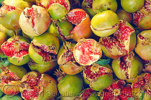 split pomegranates at farmers market, farmers market, fruit market, fruits, plants, pomegranates, pulp, punica granatum, red, ripe, split, street market