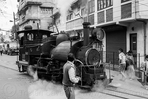steam locomotive on street - darjeeling (india), 788 tusker, cars, darjeeling himalayan railway, darjeeling toy train, narrow gauge, railroad tracks, road, steam engine, steam locomotive, steam train engine, traffic, train tracks