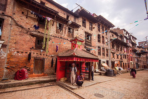 street with old brick houses and small red hindu shrine - bhaktapur (nepal), bhaktapur, hinduism, houses, shrine