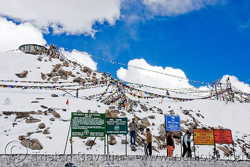 summit - khardungla pass - ladakh (india), buddhism, khardung la pass, ladakh, mountain pass, mountains, prayer flags, signs, snow, tibetan