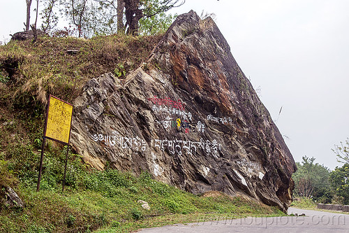 tibetan writing painted on cliff - sikkim (india), road sign, rock, sikkim, tibetan
