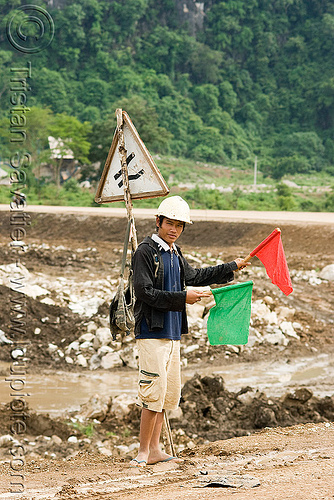 traffic semaphore guy - low-tech traffic control (laos), flagman, flags, man, red, roadwork, traffic control, traffic semaphore, worker