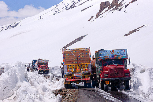trucks passing each other on narrow mountain road - manali to leh highway (india), baralacha pass, baralachala, ladakh, mountain pass, mountains, road, snow, trucks