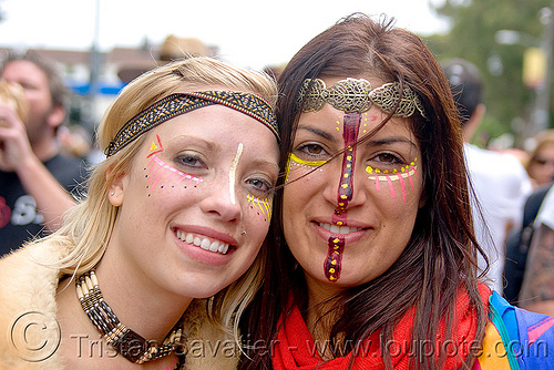 two women with tribal makeup and jewelry, andis, bay to breakers, costume, face painting, facepaint, footrace, headdress, hippie, jewelry, makeup, necklace, street party, tribal, woman