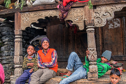 village kids sitting in front of old traditional house with wood carvings (india), boys, carved, children, columns, house, intricate, janki chatti, kids, knit cap, sitting, village, wood carving