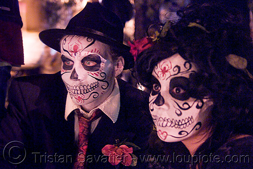 white skull makeup - couple - dia de los muertos - halloween (san francisco), day of the dead, dia de los muertos, face painting, facepaint, halloween, man, night, sugar skull makeup, woman