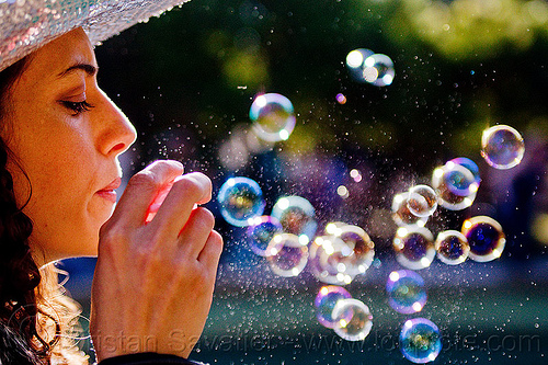 woman blowing soap bubbles, blowing, pople, soap bubbles, spring training, woman