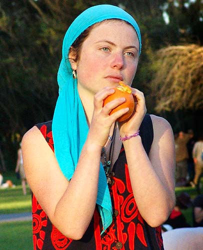 woman holding an orange (san francisco), blue, colorful, lena, orange fruit, red, woman