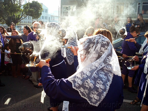 woman holding thurible with smoking incense at catholic procession, backlight, censer, crowd, incense, lace, lord of miracles, parade, peruvians, señor de los milagros, smoke, smoking, thurible, veiled, white veils, women