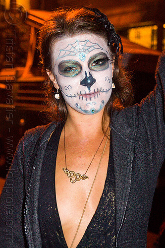 woman with skull makeup - dia de los muertos, brass necklace, day of the dead, dia de los muertos, face painting, facepaint, halloween, night, snakes necklace, sugar skull makeup, woman