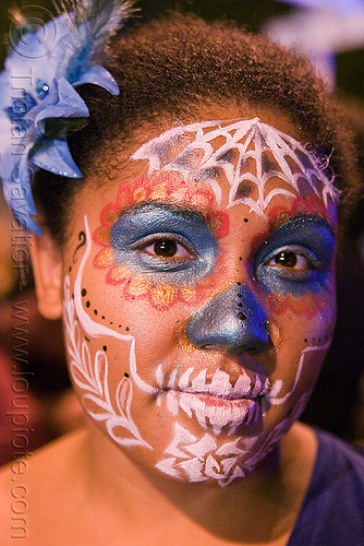 woman with skull makeup - día de los muertos - halloween (san francisco), blue flower, day of the dead, dia de los muertos, face painting, facepaint, flower headdress, flower headwear, halloween, night, sugar skull makeup, woman
