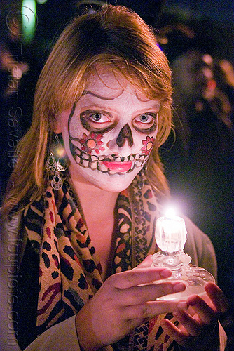 woman with skull makeup holding candle - día de los muertos - halloween (san francisco), candle light, day of the dead, dia de los muertos, face painting, facepaint, halloween, night, sugar skull makeup, woman