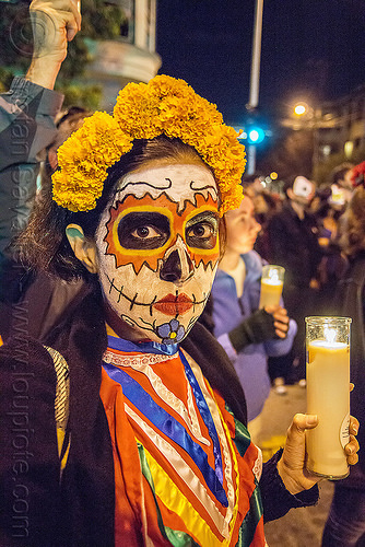 woman with skull makeup - marigold flower headdress - holding glass candle - dia de los muertos, day of the dead, dia de los muertos, face painting, facepaint, glass candle, halloween, marigold flowers headdress, night, sugar skull makeup, woman
