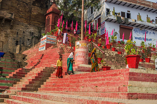 women walking on red-painted ghats - varanasi (india), dolphin restaurant, ghats, painted, pink flags, rashmi guest house, red color, red ghat, red steps, stairs, varanasi, walking, women