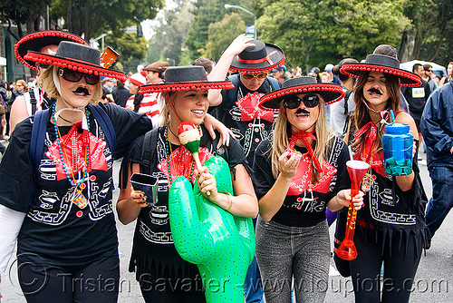 women with black and red sombreros, bay to breakers, costumes, footrace, mariachis, mexican hats, red, sombreros, street party