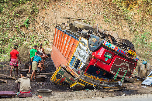 workers unloading overturned truck (india), cabin, coal, crash, crushed, ditch, lorry accident, men, overturned, road, rollover, shoveling, tata motors, traffic accident, truck accident, up-side-down, workers, working, wreck