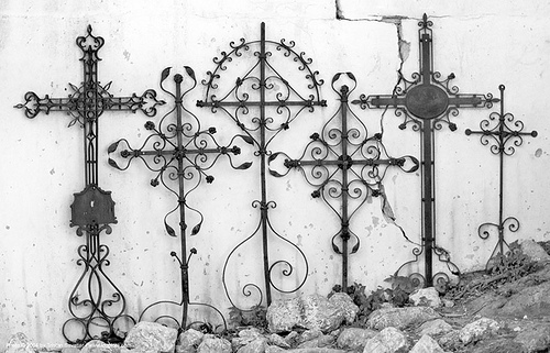 wrought iron crosses along wall (croatia), cemetery, croatia, graveyard, iron crosses, ironwork, krk island, metalwork, omisalj, wrought