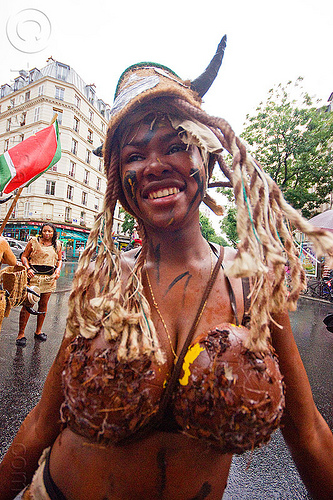 young caribbean woman wearing coconut bra - choukaj - carnaval tropical (paris), caribbean, carnaval tropical, choukaj, coconut bra, costumes, creole, créole, dancing, guadeloupe, hat, indigenous culture, parade, traditional, tribal, west indies, woman