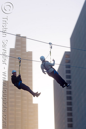 zip-line over san francisco, adventure, buildings, cable line, cables, climbing helmet, embarcadero, hanging, high-rise, mountaineering, moving fast, speed, steel cable, tower, trolley, tyrolienne, urban, zip line, zip wire