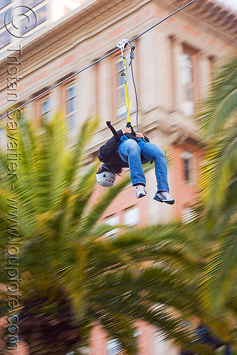 zip-line over san francisco, adventure, blue sky, cable line, cables, climbing helmet, embarcadero, hanging, mountaineering, moving fast, palm trees, speed, steel cable, trolley, tyrolienne, urban, zip line, zip wire