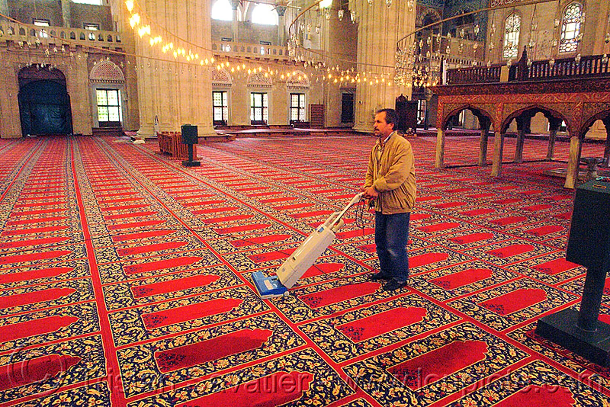 vacuuming the selimiye mosque carpet