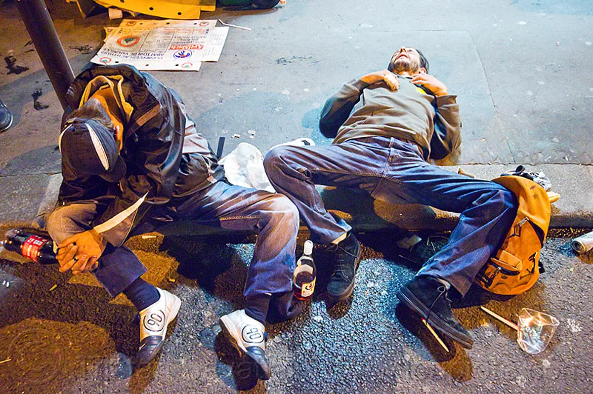 drunk men passed out on the street