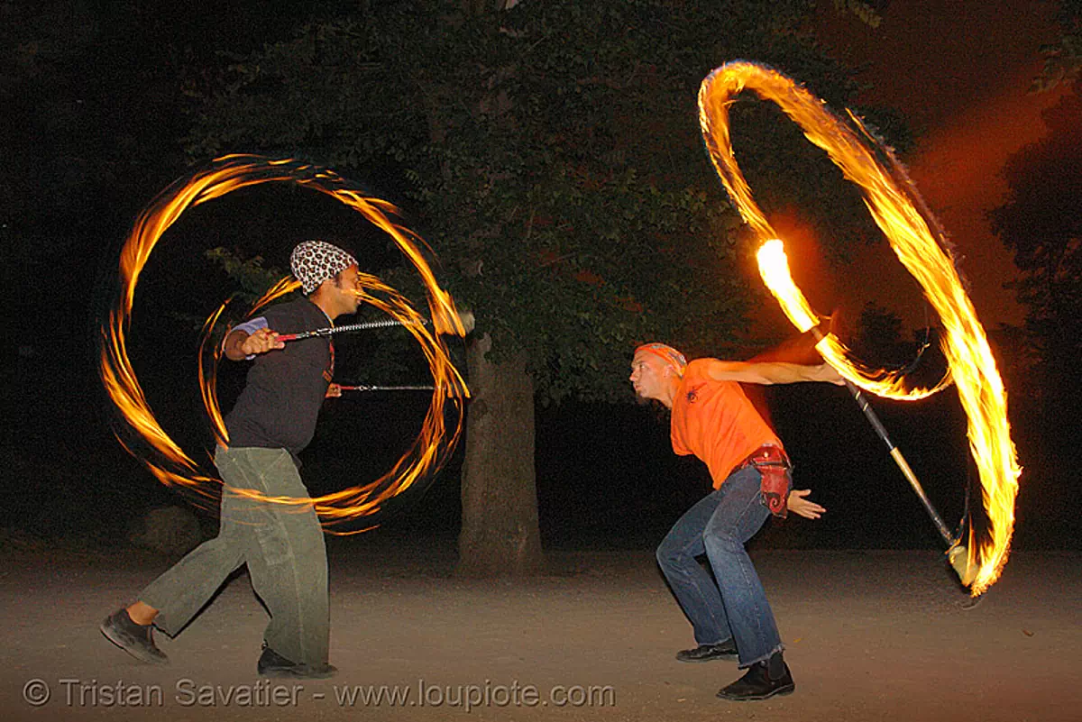alex and john-paul spinning fire  (san francisco), fire dancer, fire dancing, fire performer, fire poi, fire spinning, fire staff, john-paul, night, shanti alex, spinning fire