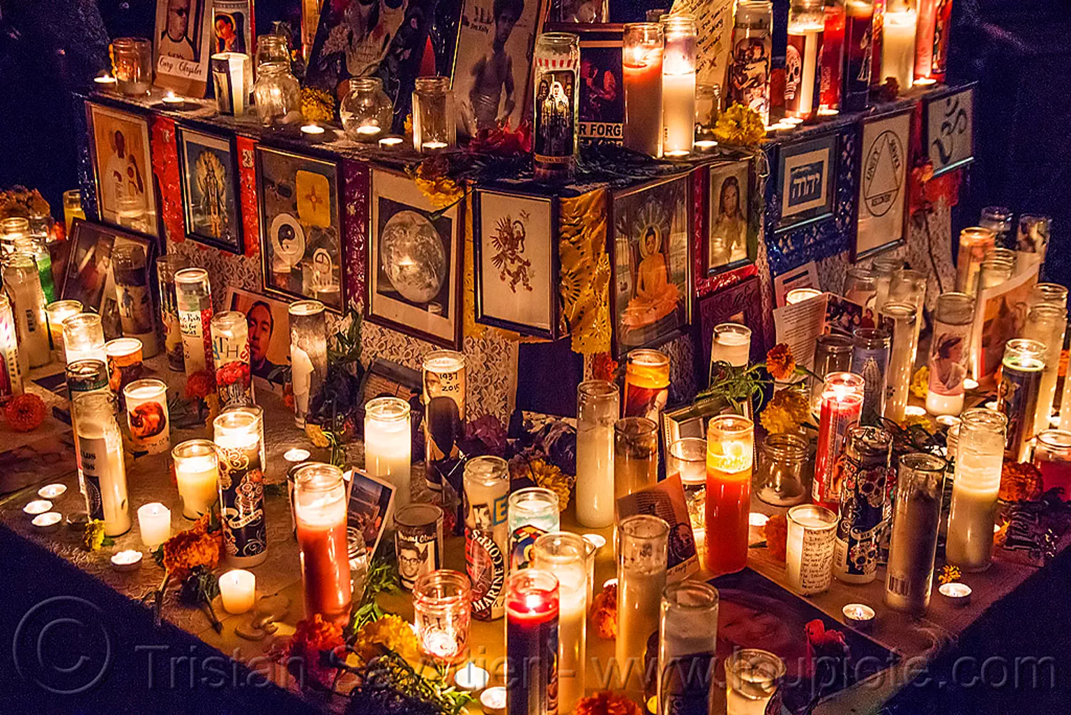 altar de muertos with glass candles, dia de los muertos